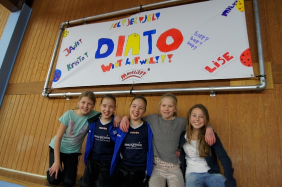 De supersupporters met het spandoek